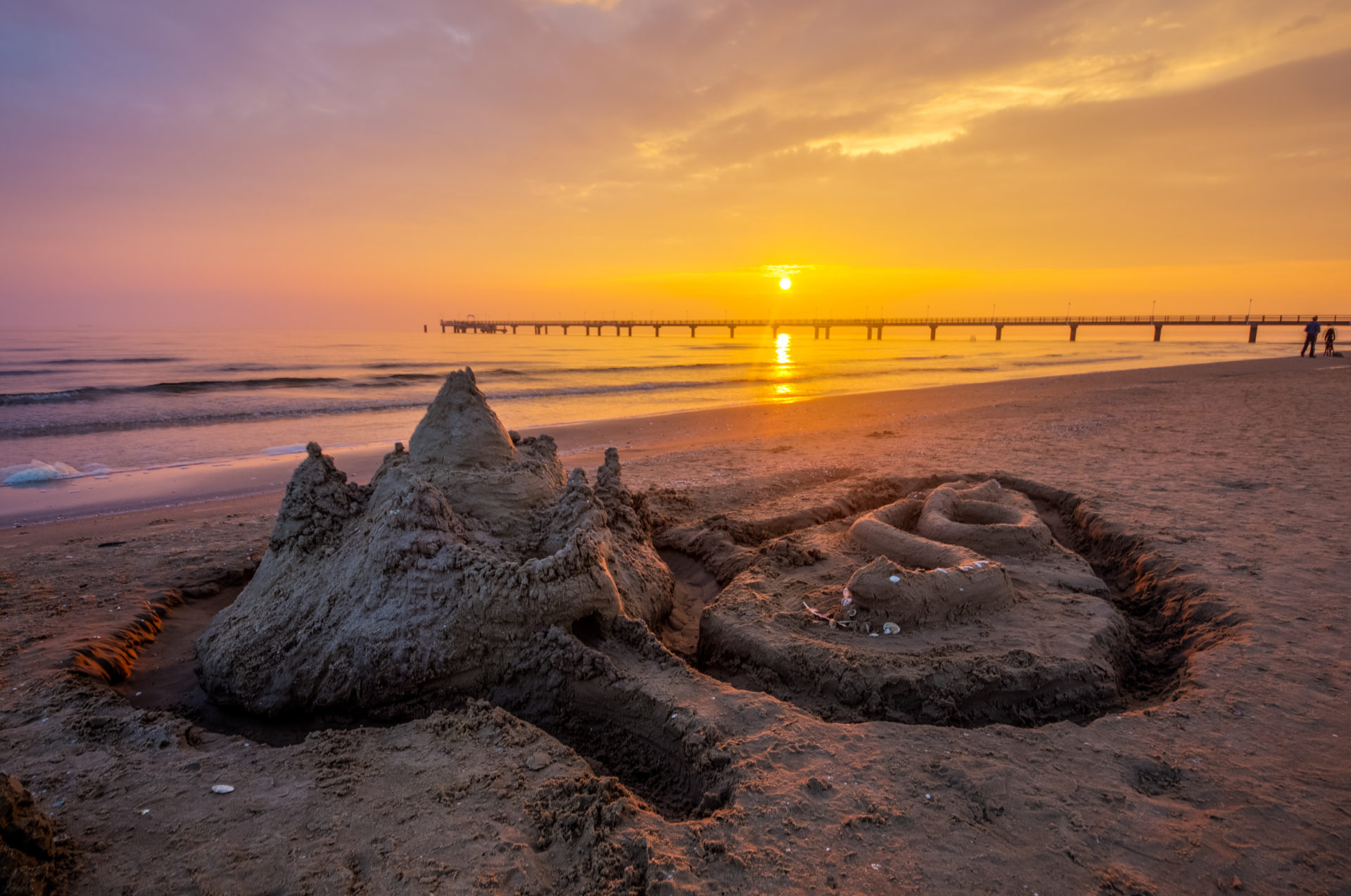 Plaża Bansin z zamkiem z piasku o zachodzie słońca | Łaźnie Cesarskie Uznam